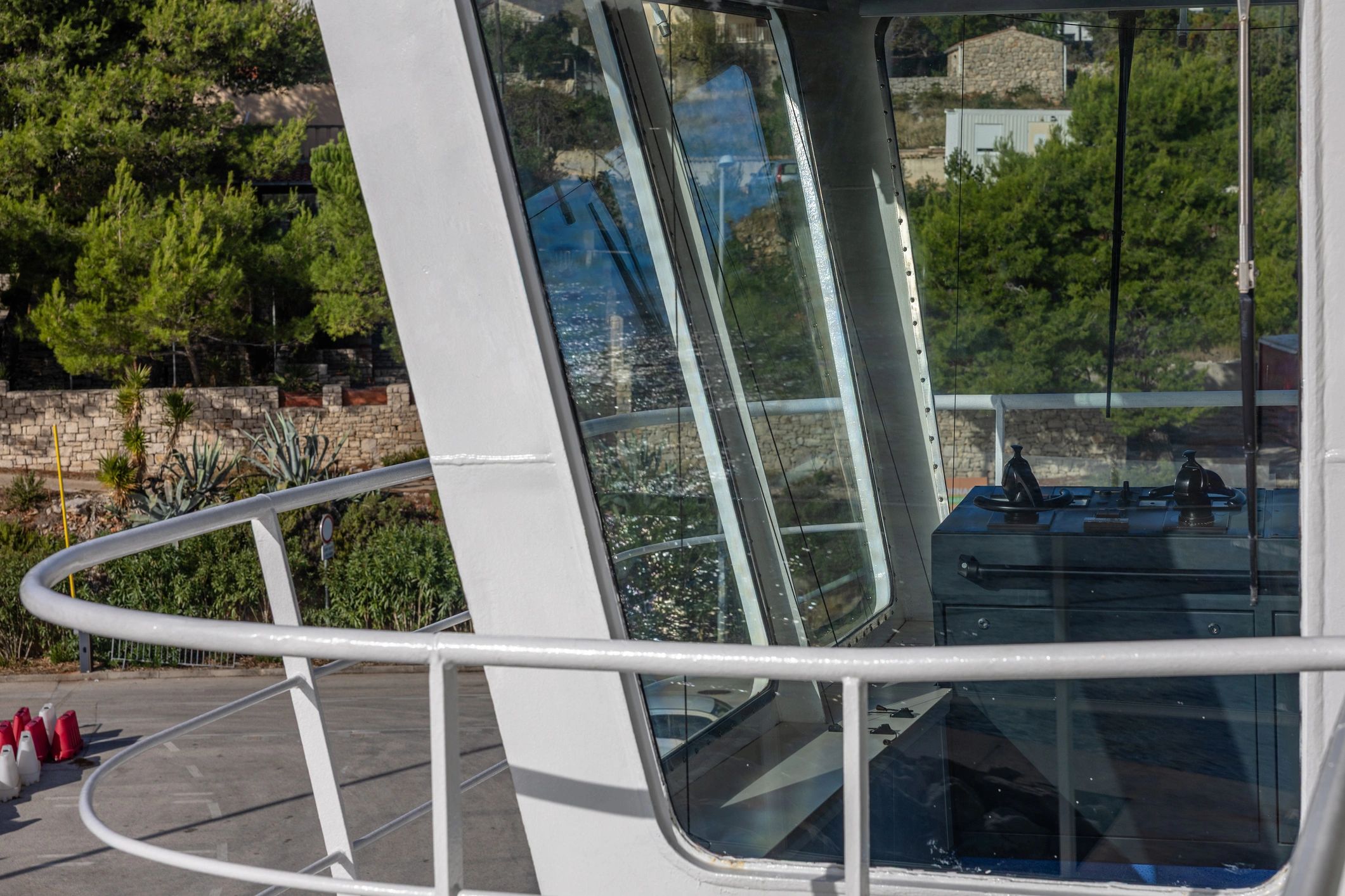 Boat deck on calm coastal water