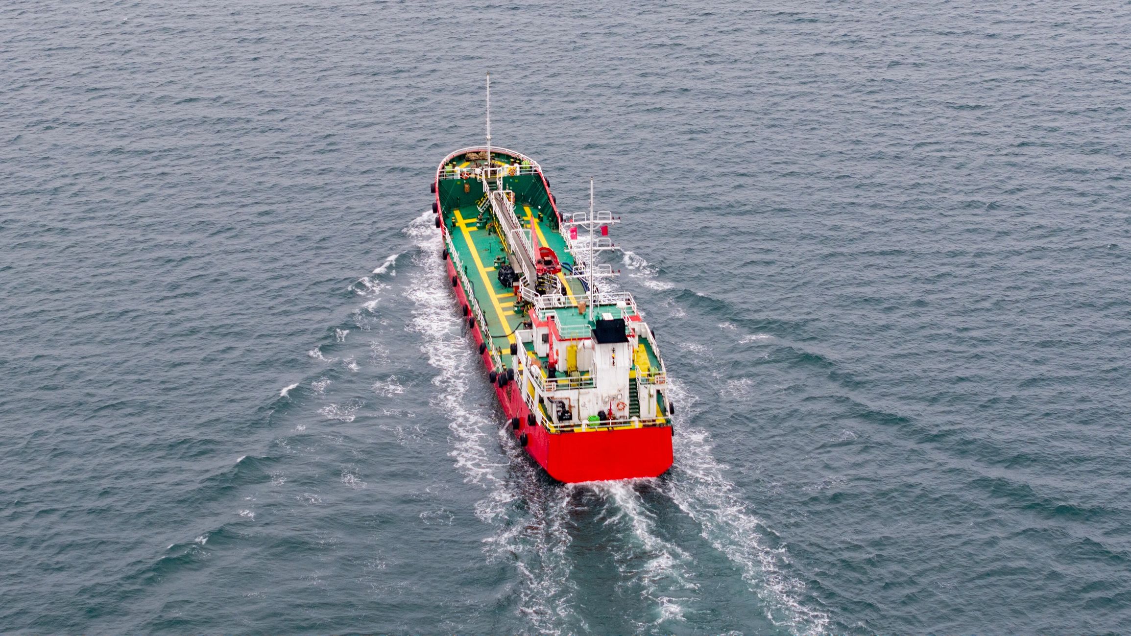 Cargo vessel transporting goods across the sea