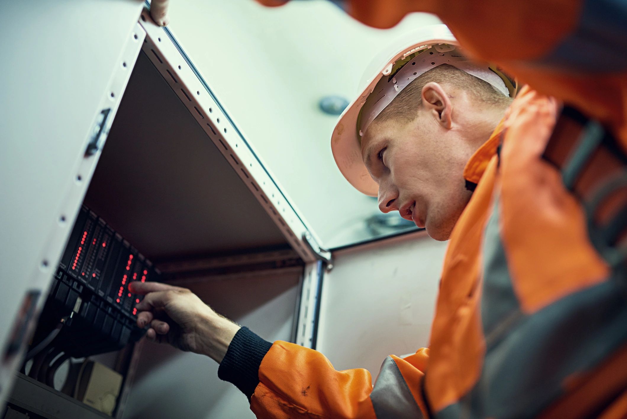 Technician performing equipment maintenance